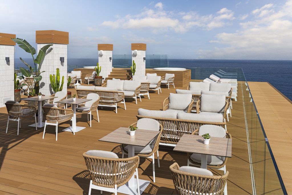 Terrazza con sedie e tavoli in legno vista mare a Tenerife.
