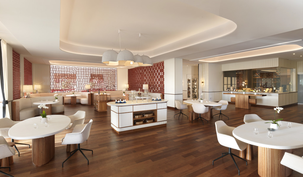 Ristorante moderno con sedie bianche e tavoli rotondi a Tenerife.